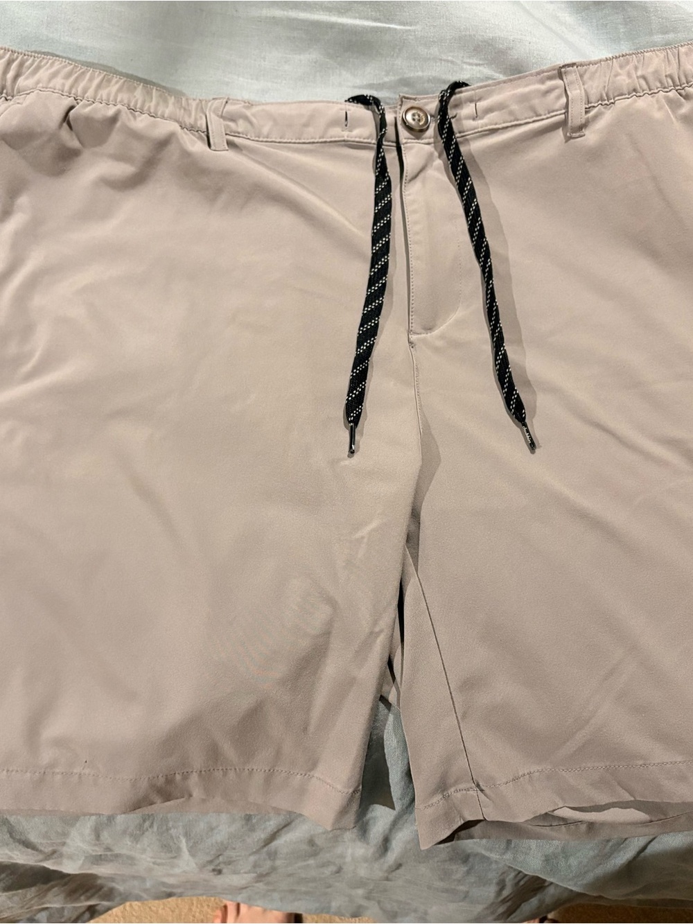 chubbies Light Beige Hybrid Shorts with Black Drawstring.
